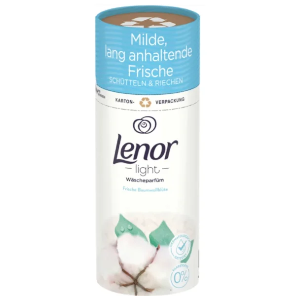 The image shows a light blue and white cylindrical bottle of Lenor laundry perfume, with the fragrance "Frische Baumwollblüte" (Fresh Cotton Blossom). The label at the top of the bottle reads "Milde, lang anhaltende Frische" (Mild, Long-Lasting Freshness) followed by "SCHÜTTELN & RIECHEN" (Shake & Smell). The Lenor logo is prominently displayed in dark blue text, with "light" written below it. There is an image of cotton blossoms at the bottom, emphasizing the fresh and clean scent. The background features a gradient of light blue hues, enhancing the sense of mildness and purity.